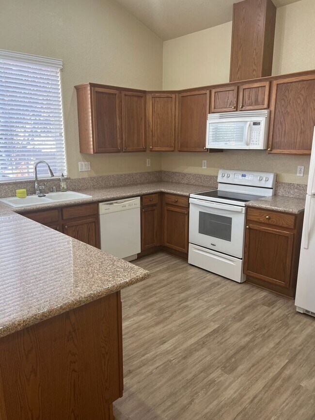 Building Photo - Located in the Gated Community of Casitas ...