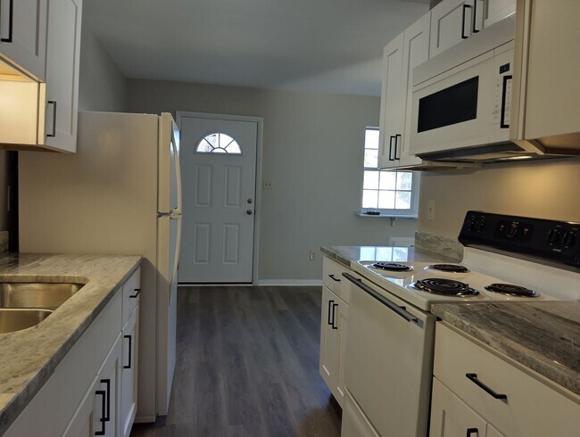 Building Photo - 7604 Bellhaven Drive (Unit 10)