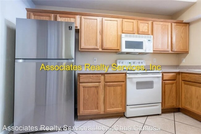 Building Photo - 3 br, 3.5 bath House - 4938 NW 1st Place