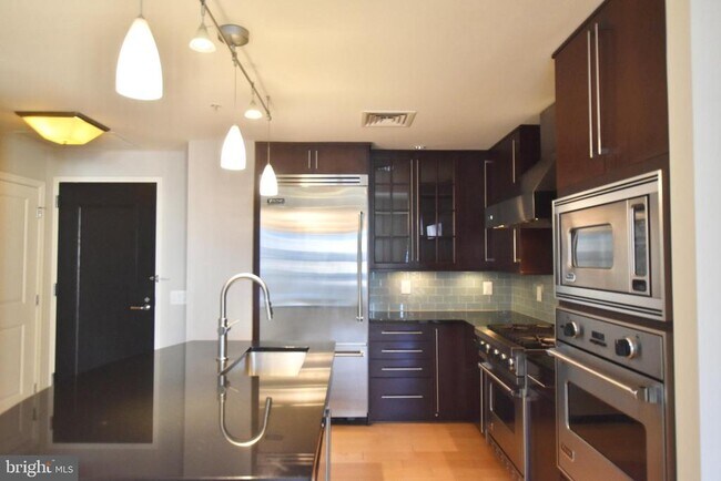 Building Photo - 7710 Woodmont Ave