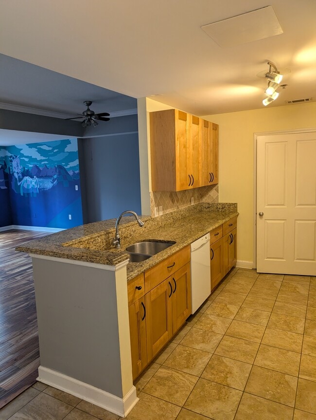 Kitchen with updated cabinetry - 1101 Juniper St NE