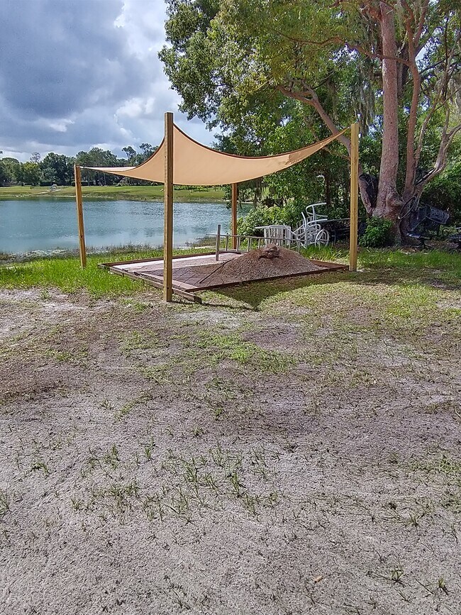 Backyard gazebo overlooking lake - 63 S Winter Park Dr