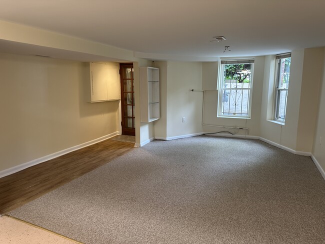 Living room showing entrance to the left - 1336 Kenyon St NW