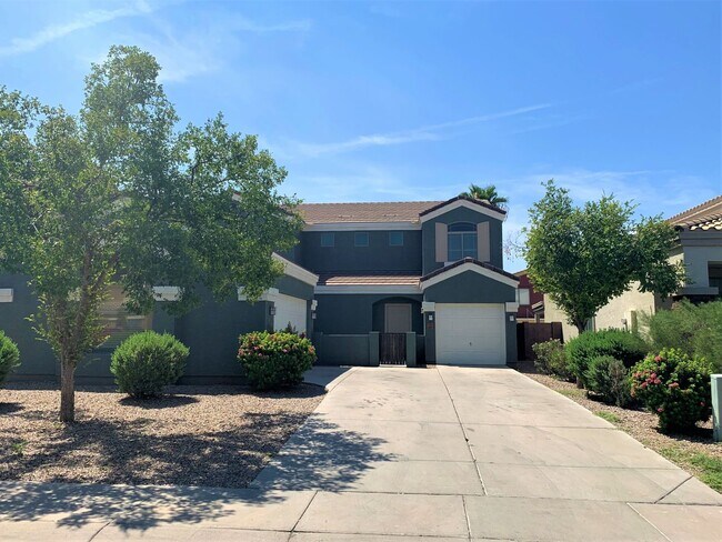 Building Photo - 4 bed 3 bath with 3 car garage in loving T...