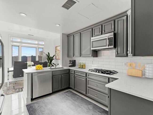 Foto del edificio - 2401 Pennsylvania | 2-Bedroom Apartments