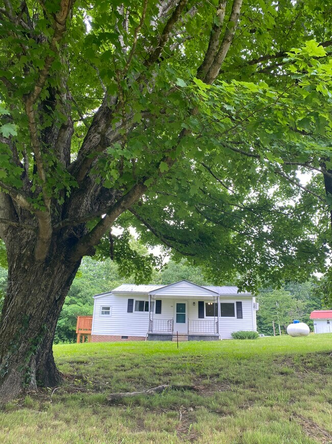 Front of house with shade trees - 3186 Bowker Rd