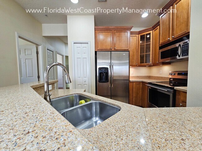 Foto del edificio - MOVE IN READY! 3 BEDROOM/ 2 BATH CONDO AT ...