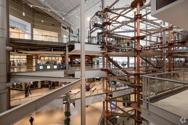 The Palisades Center in New City, NY features a large climbing structure in the atrium.