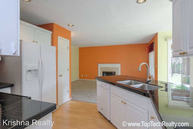 Building Photo - 4 br, 2.5 bath House - 5910 NW Snowlily Dr