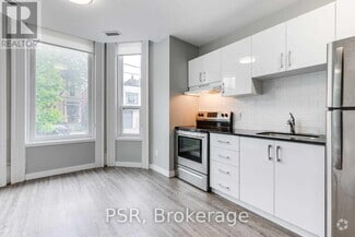 Building Photo - 205-205 Gerrard St E