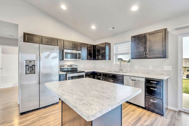 Building Photo - Modern Elegance Beckons at Summerland Park...