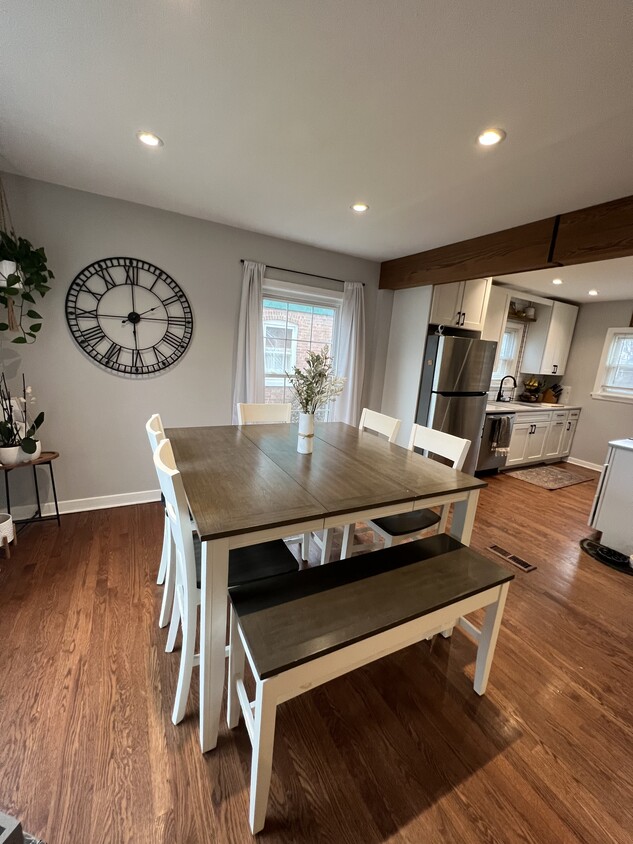 Open concept living room, dining room & kitchen. Fully remodeled and updated - 7336 Tapper Ave