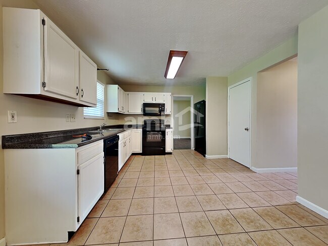 Foto del edificio - 3300 Whispering Woods Dr