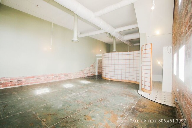 Building Photo - Utilities Included - Nice, Large Loft Loca...