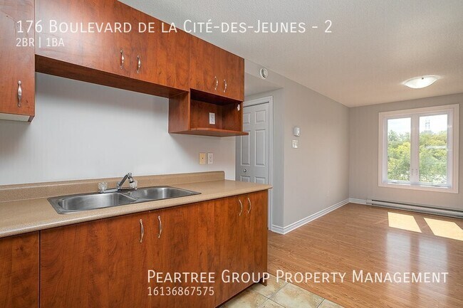 Building Photo - Charming 2 Bedroom End Unit Condo