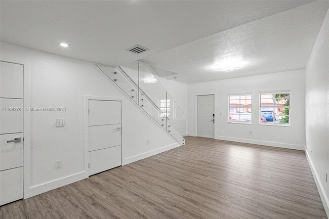 Building Photo - 9837 W Okeechobee Rd