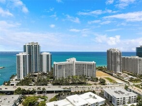 Building Photo - 10275 Collins Ave