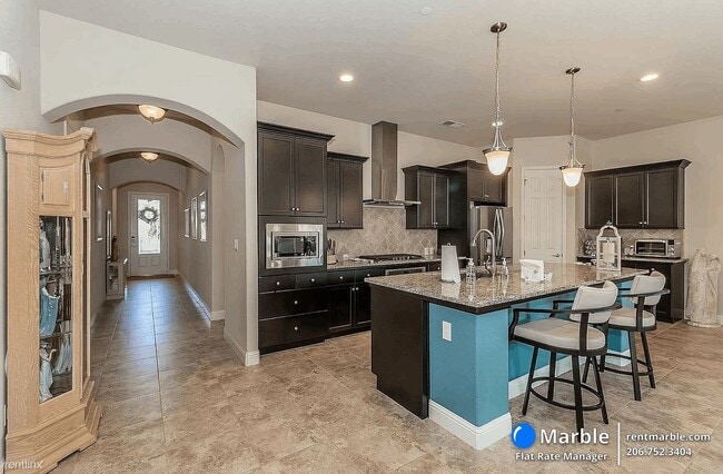 Foto del edificio - 4 br, 2.5 bath House - 6149 E Terrace Ave