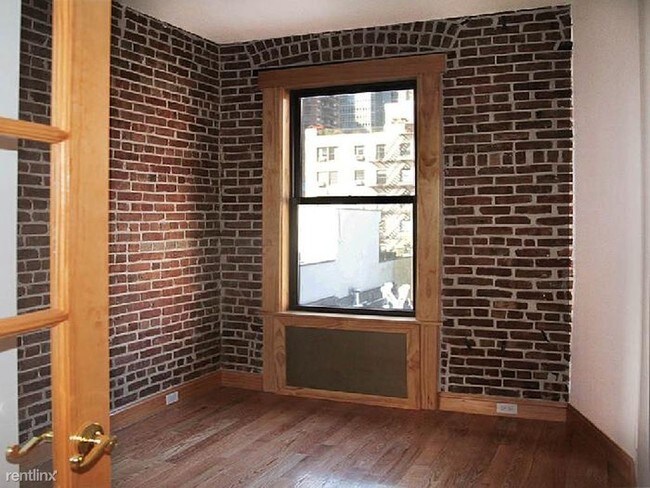 Foto del edificio - 324 E 52nd St