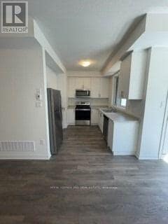 Photo du bâtiment - 9460-9460 The Gore Rd