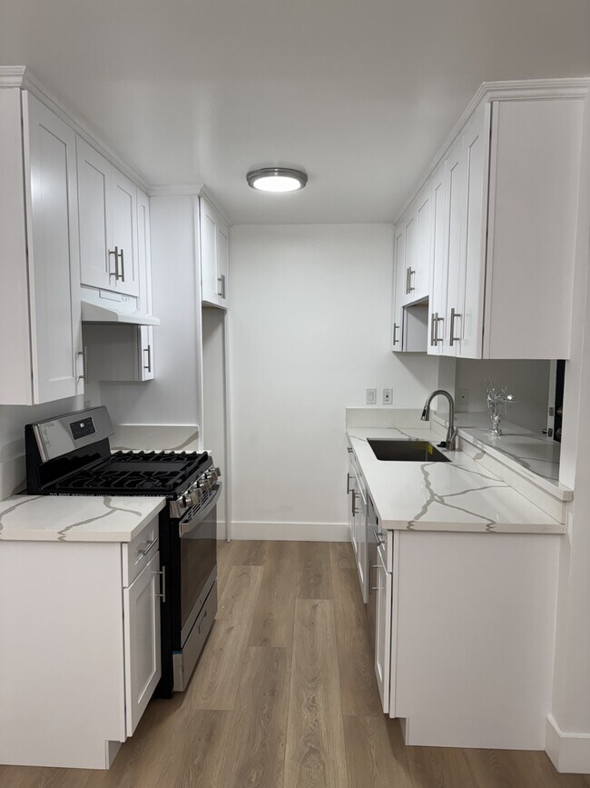 1 dormitorio cocina - Covina Plaza Apartments