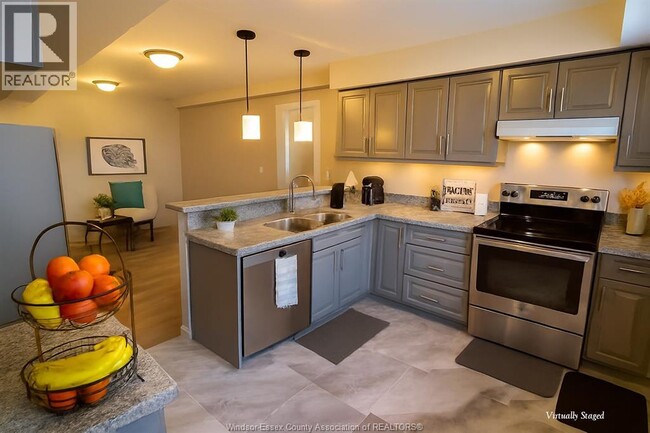 Building Photo - 3985 Grand Marais Rd E