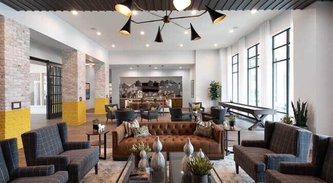 Building Photo - Downtown Dwellings: Where Convenience Meet...