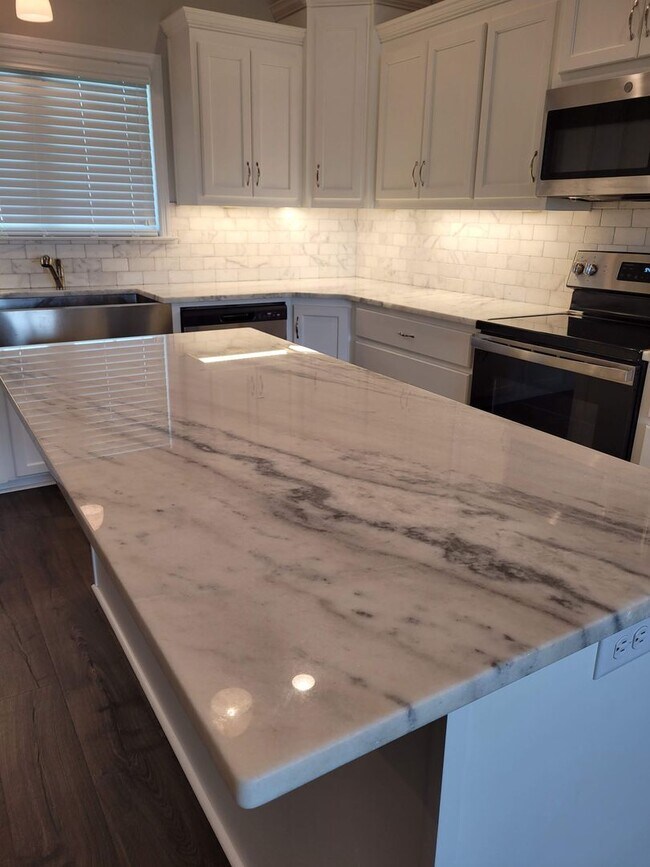 Foto del edificio - Luxurious Living: Spacious 4 Bedroom Home ...