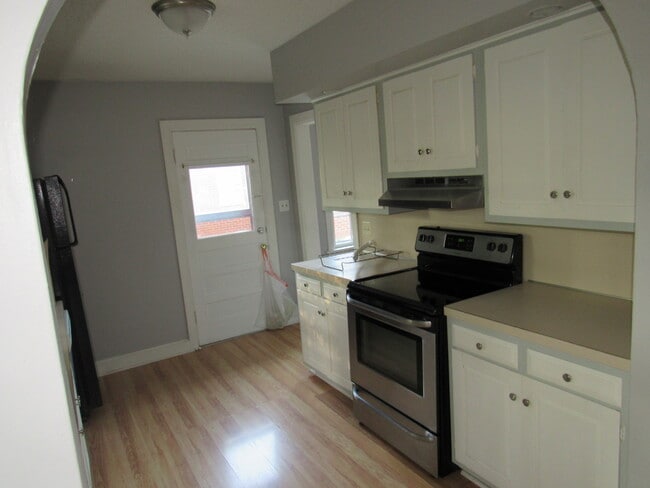 Upstairs kitchen - 1165 S National Ave