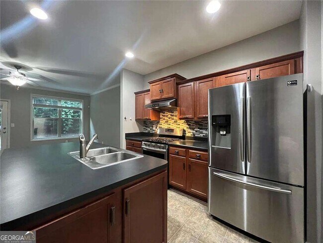 Foto del edificio - 6996 Kingswood Run Dr