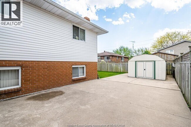 Building Photo - 8351 Kingston Cres