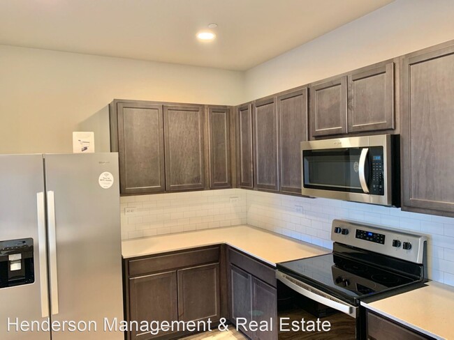 Building Photo - 3 br, 2.5 bath House - 6611 4th St. Rd. #3