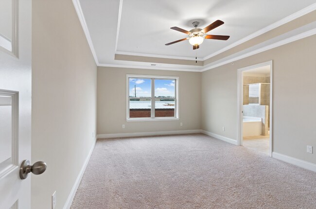 Building Photo - Single Family 3 Bedroom Townhome in Woodst...