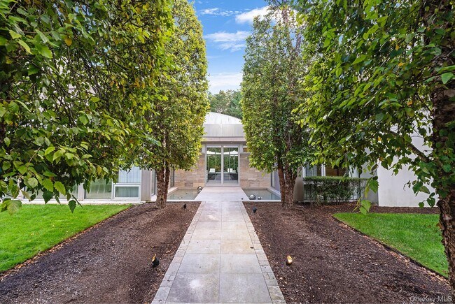 Foto del edificio - 7 Rolling Wood Ln