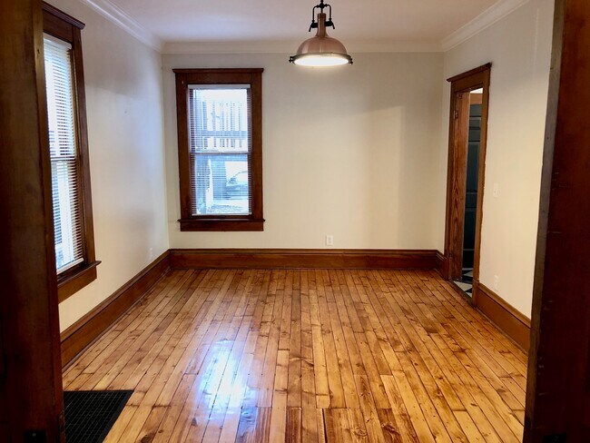 Living room kitchen door to front right - 1870 W 47th St