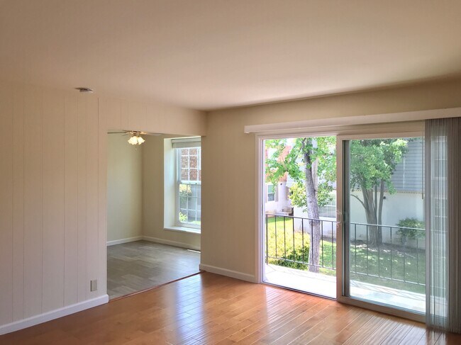 Note: This is the upstairs living room (not available). The downstairs living room is similar. - 977 Mangrove Ave