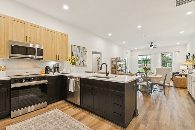 Building Photo - Rise at Glen Kernan Park  55+ Active Adult Apartment Homes