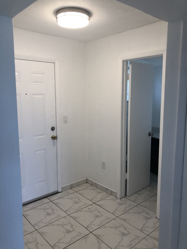 Entry - 1201 NE 191st St