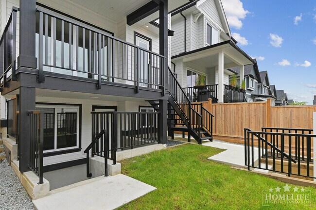 Photo du bâtiment - Beautiful Above Ground Level 2-bed 1-bath Legal Basement Suite