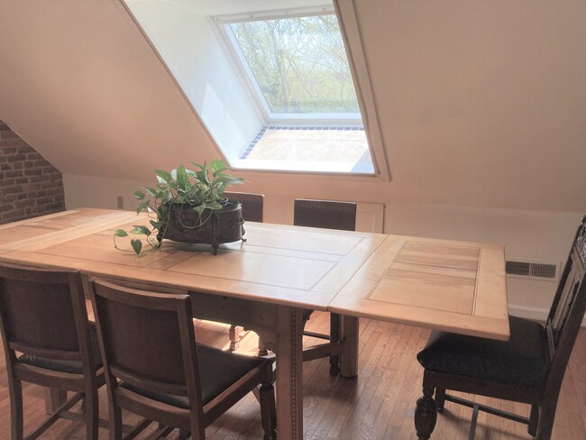 Dinning area under the loft skylight - 967 Breckinridge Mill Rd