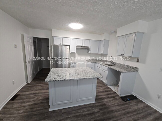 Foto del edificio - 1409 Tinnin Ave