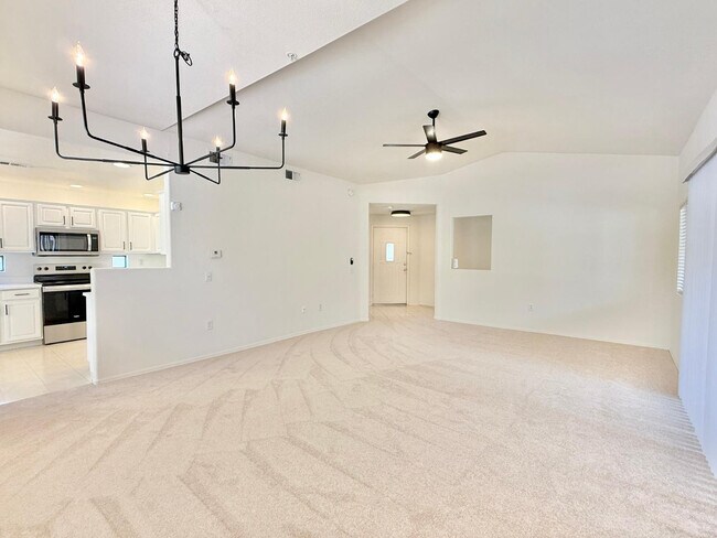 Foto del edificio - 9455 E Raintree Dr