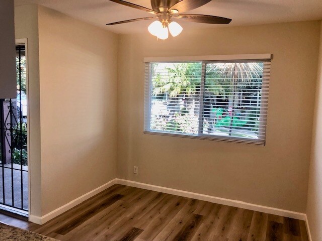 Comedor: Persianas, ventanas y ventilador de techo nuevos. - 16181 Ganges Lane #2, Huntington Beach, CA 92647