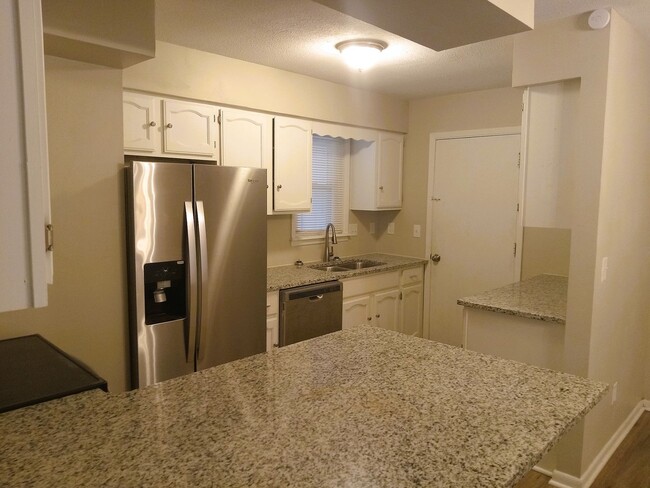 Building Photo - Darling Home in Bel Aire - Finished Baseme...