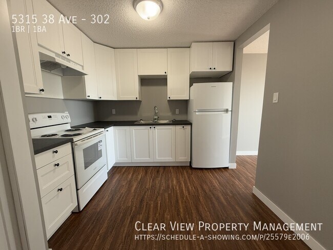 Photo du bâtiment - ? Beautifully Renovated One-Bedroom Suite in Taber Manor!