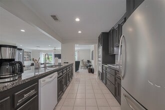 Building Photo - 24 Champions Colony E