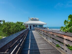 Building Photo - 6361 Pelican Bay Blvd