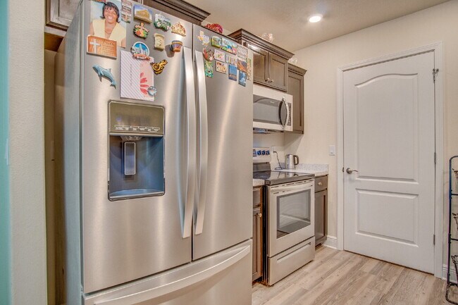 Building Photo - Spacious Cottage-Style Home Near UWF, Navy Federal & West Florida Hospital with Private Upstairs ...