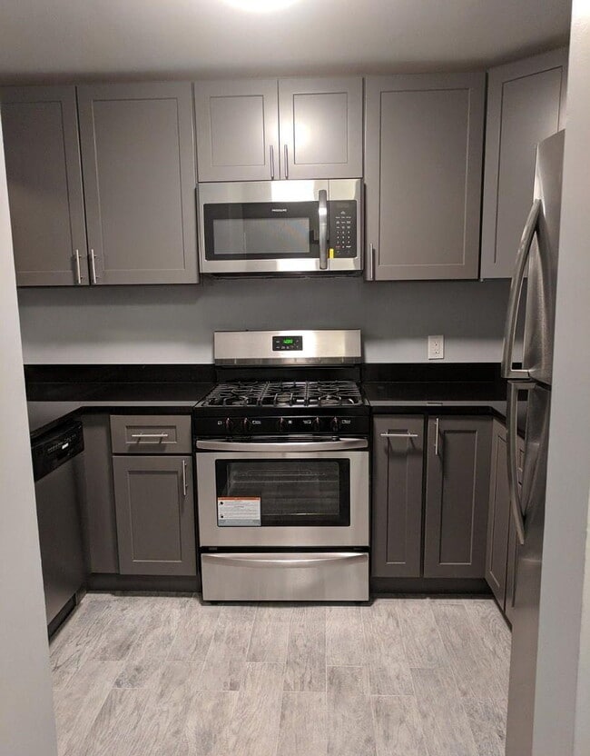 Foto del edificio - "Charming 2-Bedroom Gem with Granite Count...