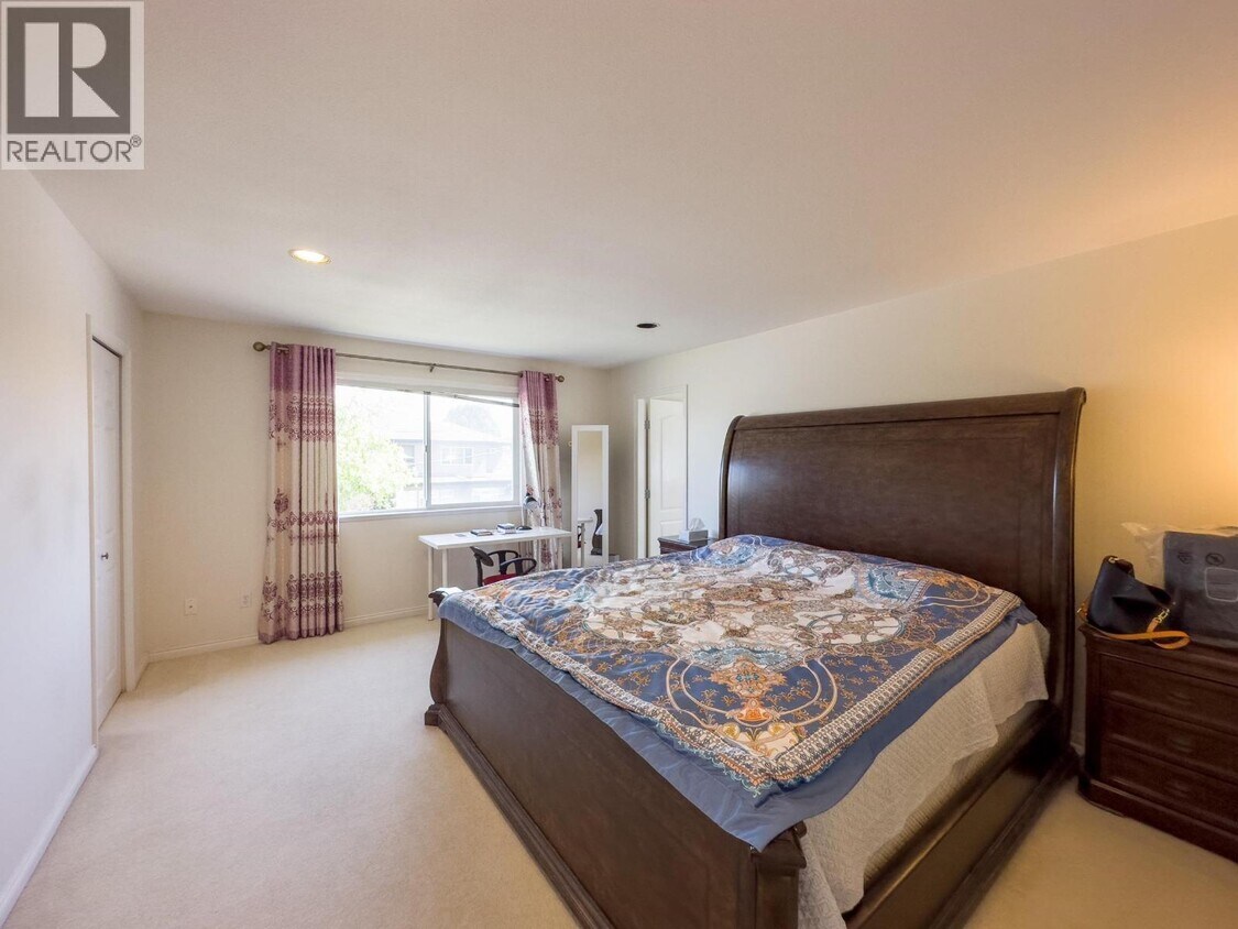 Photo du bâtiment - 70XX Bridge St